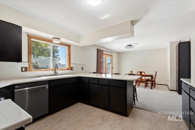 This classic split-level home offers plenty of space and on Indian Lakes Golf Course in Idaho - for sale on GolfHomes.com, golf home, golf lot