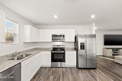 Discover modern Florida living in this move in ready 3-bedroom on Sunny Hills Golf and Country Club in Florida - for sale on GolfHomes.com, golf home, golf lot