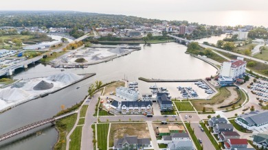 Enjoy carefree living in this spacious 2000 sq. ft. Harbor on Harbour Shores Golf Course in Michigan - for sale on GolfHomes.com, golf home, golf lot