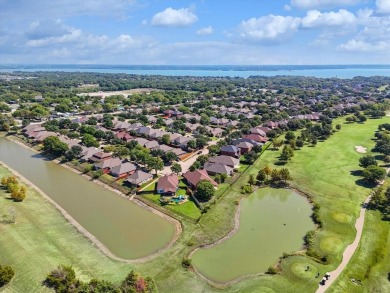 Discover this fantastic home on the 15th green of the WaterView on Jim Boggs in Texas - for sale on GolfHomes.com, golf home, golf lot