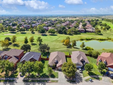 Discover this fantastic home on the 15th green of the WaterView on Jim Boggs in Texas - for sale on GolfHomes.com, golf home, golf lot