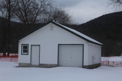 Large farmhouse with BIG backyard. Waiting to be renovated and on Twin Village Golf Club in New York - for sale on GolfHomes.com, golf home, golf lot