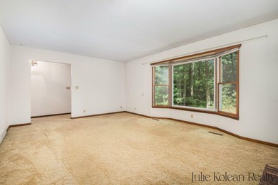 Don't miss this opportunity to own a well-maintained property on on Grand Haven Golf Club in Michigan - for sale on GolfHomes.com, golf home, golf lot