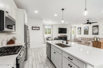 Estrella Mountain Ranch Smart Home built in 2024- shows like a on Estrella Mountain Ranch Golf Course in Arizona - for sale on GolfHomes.com, golf home, golf lot