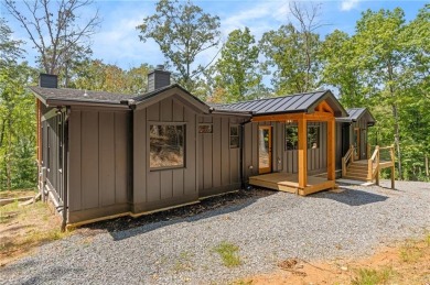 Located just 6 miles from Downtown Blue Ridge and less than a on Old Toccoa Farm Golf Club in Georgia - for sale on GolfHomes.com, golf home, golf lot