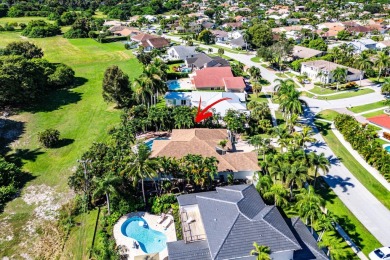 Nestled in the heart of Boca Raton's prestigious Hidden Valley on Ocean Breeze Golf and Country Club in Florida - for sale on GolfHomes.com, golf home, golf lot