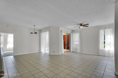 A one of a kind luxury condo with a natural sunlight penetrating on St. Augustine Shores Golf Club in Florida - for sale on GolfHomes.com, golf home, golf lot