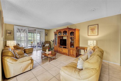 Wow! Beautiful 3-bed, 2-bath Corner Unit Condo That Overlooks on Pine Island Ridge Country Club in Florida - for sale on GolfHomes.com, golf home, golf lot