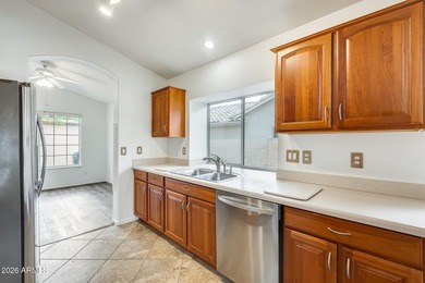 Square footage includes enclosed House (1287) sun room (327)and on Sun Village Golf Course in Arizona - for sale on GolfHomes.com, golf home, golf lot