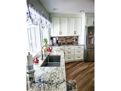 THIS IS THE ONE !! Beautifully remodeled inside and out! This on Kelly Greens Golf and Country Club in Florida - for sale on GolfHomes.com, golf home, golf lot