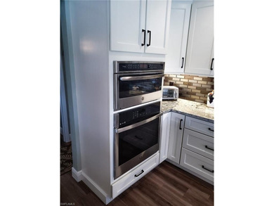 THIS IS THE ONE !! Beautifully remodeled inside and out! This on Kelly Greens Golf and Country Club in Florida - for sale on GolfHomes.com, golf home, golf lot