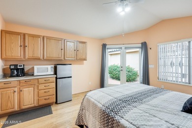 Square footage includes enclosed House (1287) sun room (327)and on Sun Village Golf Course in Arizona - for sale on GolfHomes.com, golf home, golf lot