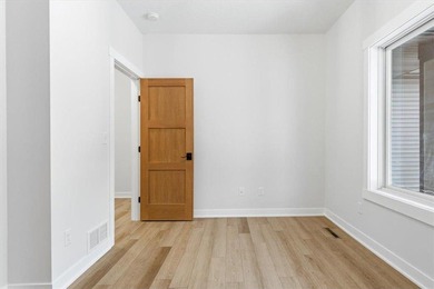 Nestled in the heart of the Hadley Hills neighborhood lies this on Hadley Creek Golf Course in Minnesota - for sale on GolfHomes.com, golf home, golf lot