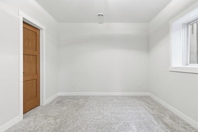 Nestled in the heart of the Hadley Hills neighborhood lies this on Hadley Creek Golf Course in Minnesota - for sale on GolfHomes.com, golf home, golf lot