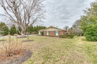 Welcome home to this stunning 5-bedroom, 3-bathroom brick ranch on Country Club of Bristol in Tennessee - for sale on GolfHomes.com, golf home, golf lot