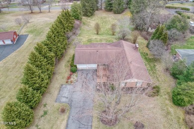 Welcome home to this stunning 5-bedroom, 3-bathroom brick ranch on Country Club of Bristol in Tennessee - for sale on GolfHomes.com, golf home, golf lot