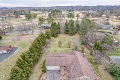 Welcome home to this stunning 5-bedroom, 3-bathroom brick ranch on Country Club of Bristol in Tennessee - for sale on GolfHomes.com, golf home, golf lot