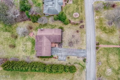 Welcome home to this stunning 5-bedroom, 3-bathroom brick ranch on Country Club of Bristol in Tennessee - for sale on GolfHomes.com, golf home, golf lot