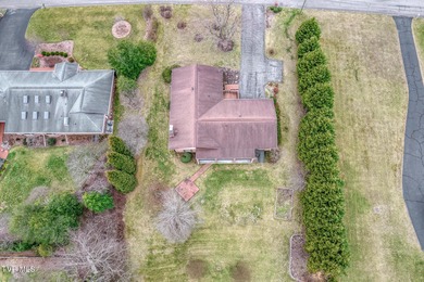 Welcome home to this stunning 5-bedroom, 3-bathroom brick ranch on Country Club of Bristol in Tennessee - for sale on GolfHomes.com, golf home, golf lot