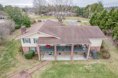 Welcome home to this stunning 5-bedroom, 3-bathroom brick ranch on Country Club of Bristol in Tennessee - for sale on GolfHomes.com, golf home, golf lot