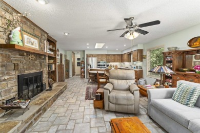 Privately nestled among the trees on over half an acre, this on Coronado Golf Course in Arkansas - for sale on GolfHomes.com, golf home, golf lot
