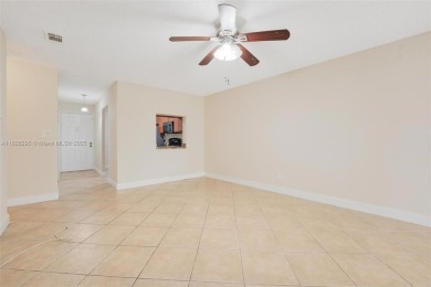Immaculate, spacious  bright 2+/2 with extra room for use as 3rd on Woodmont Country Club in Florida - for sale on GolfHomes.com, golf home, golf lot