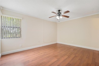 Immaculate, spacious  bright 2+/2 with extra room for use as 3rd on Woodmont Country Club in Florida - for sale on GolfHomes.com, golf home, golf lot