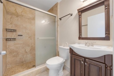 Immaculate, spacious  bright 2+/2 with extra room for use as 3rd on Woodmont Country Club in Florida - for sale on GolfHomes.com, golf home, golf lot