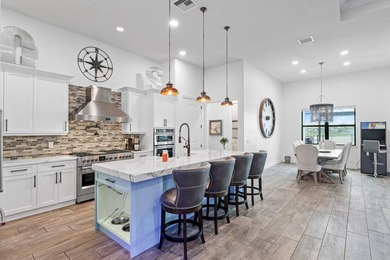 On one of the largest lots in Ancient Tree, this half-acre on Palm Beach Gardens Golf Course in Florida - for sale on GolfHomes.com, golf home, golf lot