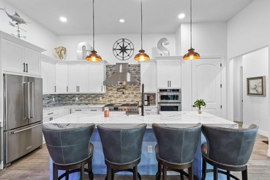 On one of the largest lots in Ancient Tree, this half-acre on Palm Beach Gardens Golf Course in Florida - for sale on GolfHomes.com, golf home, golf lot