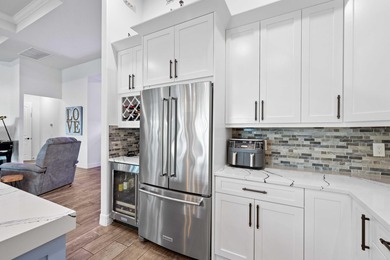 On one of the largest lots in Ancient Tree, this half-acre on Palm Beach Gardens Golf Course in Florida - for sale on GolfHomes.com, golf home, golf lot