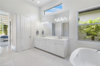 A stunning showcase of modern luxury living in Miromar Lakes on Miromar Lakes Golf Club in Florida - for sale on GolfHomes.com, golf home, golf lot
