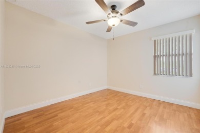 Immaculate, spacious  bright 2+/2 with extra room for use as 3rd on Woodmont Country Club in Florida - for sale on GolfHomes.com, golf home, golf lot