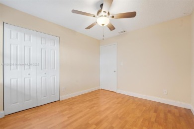 Immaculate, spacious  bright 2+/2 with extra room for use as 3rd on Woodmont Country Club in Florida - for sale on GolfHomes.com, golf home, golf lot