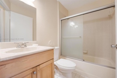 Immaculate, spacious  bright 2+/2 with extra room for use as 3rd on Woodmont Country Club in Florida - for sale on GolfHomes.com, golf home, golf lot
