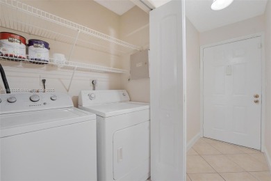 Immaculate, spacious  bright 2+/2 with extra room for use as 3rd on Woodmont Country Club in Florida - for sale on GolfHomes.com, golf home, golf lot