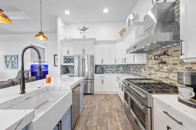 On one of the largest lots in Ancient Tree, this half-acre on Palm Beach Gardens Golf Course in Florida - for sale on GolfHomes.com, golf home, golf lot