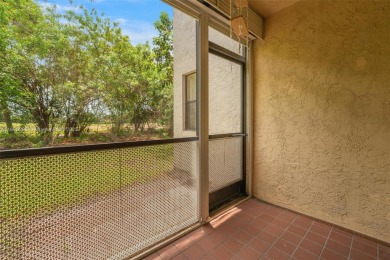Immaculate, spacious  bright 2+/2 with extra room for use as 3rd on Woodmont Country Club in Florida - for sale on GolfHomes.com, golf home, golf lot