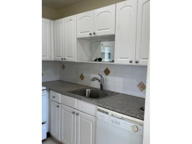 1 bedroom 1 1/2 condo with garden view, brand new microwave and on Kings Point Golf -Flanders Way in Florida - for sale on GolfHomes.com, golf home, golf lot
