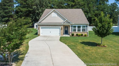 Welcome to your dream home--perfectly positioned on the lush on Ayden Golf and Country Club in North Carolina - for sale on GolfHomes.com, golf home, golf lot