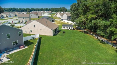 Welcome to your dream home--perfectly positioned on the lush on Ayden Golf and Country Club in North Carolina - for sale on GolfHomes.com, golf home, golf lot