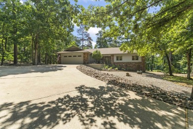 Privately nestled among the trees on over half an acre, this on Coronado Golf Course in Arkansas - for sale on GolfHomes.com, golf home, golf lot