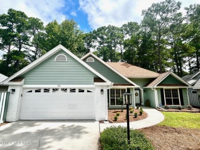 Stunning home for sale in Carolina Shores! This home has been on Carolina Shores Golf Course in North Carolina - for sale on GolfHomes.com, golf home, golf lot