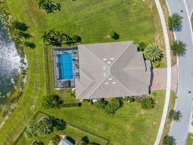 On one of the largest lots in Ancient Tree, this half-acre on Palm Beach Gardens Golf Course in Florida - for sale on GolfHomes.com, golf home, golf lot