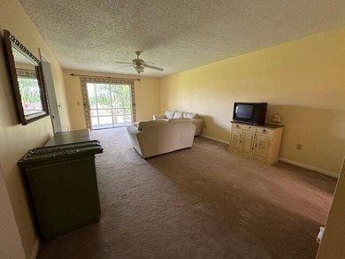 Centrally located on the 2nd floor overlooking the beautifully on Monterey Yacht and Country Club in Florida - for sale on GolfHomes.com, golf home, golf lot