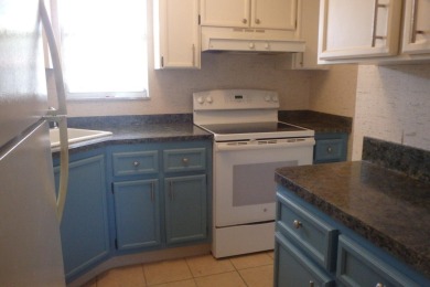 Centrally located on the 2nd floor overlooking the beautifully on Monterey Yacht and Country Club in Florida - for sale on GolfHomes.com, golf home, golf lot