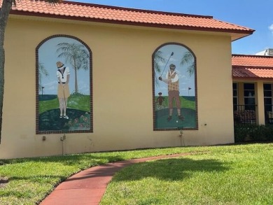 Centrally located on the 2nd floor overlooking the beautifully on Monterey Yacht and Country Club in Florida - for sale on GolfHomes.com, golf home, golf lot