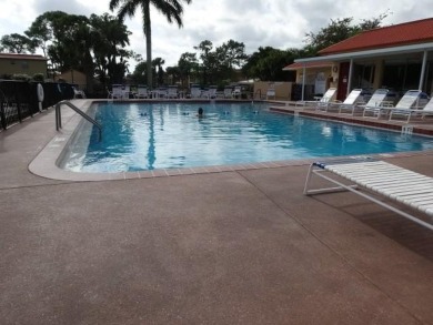 Centrally located on the 2nd floor overlooking the beautifully on Monterey Yacht and Country Club in Florida - for sale on GolfHomes.com, golf home, golf lot