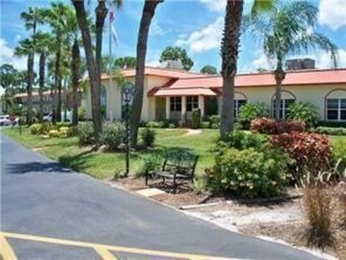 Centrally located on the 2nd floor overlooking the beautifully on Monterey Yacht and Country Club in Florida - for sale on GolfHomes.com, golf home, golf lot