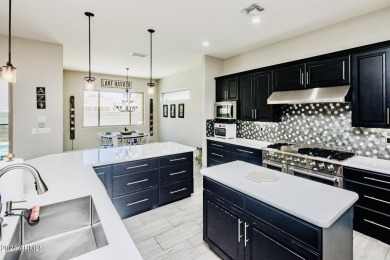 Excellent location and loaded with features! Across the street on London Bridge Golf Course in Arizona - for sale on GolfHomes.com, golf home, golf lot